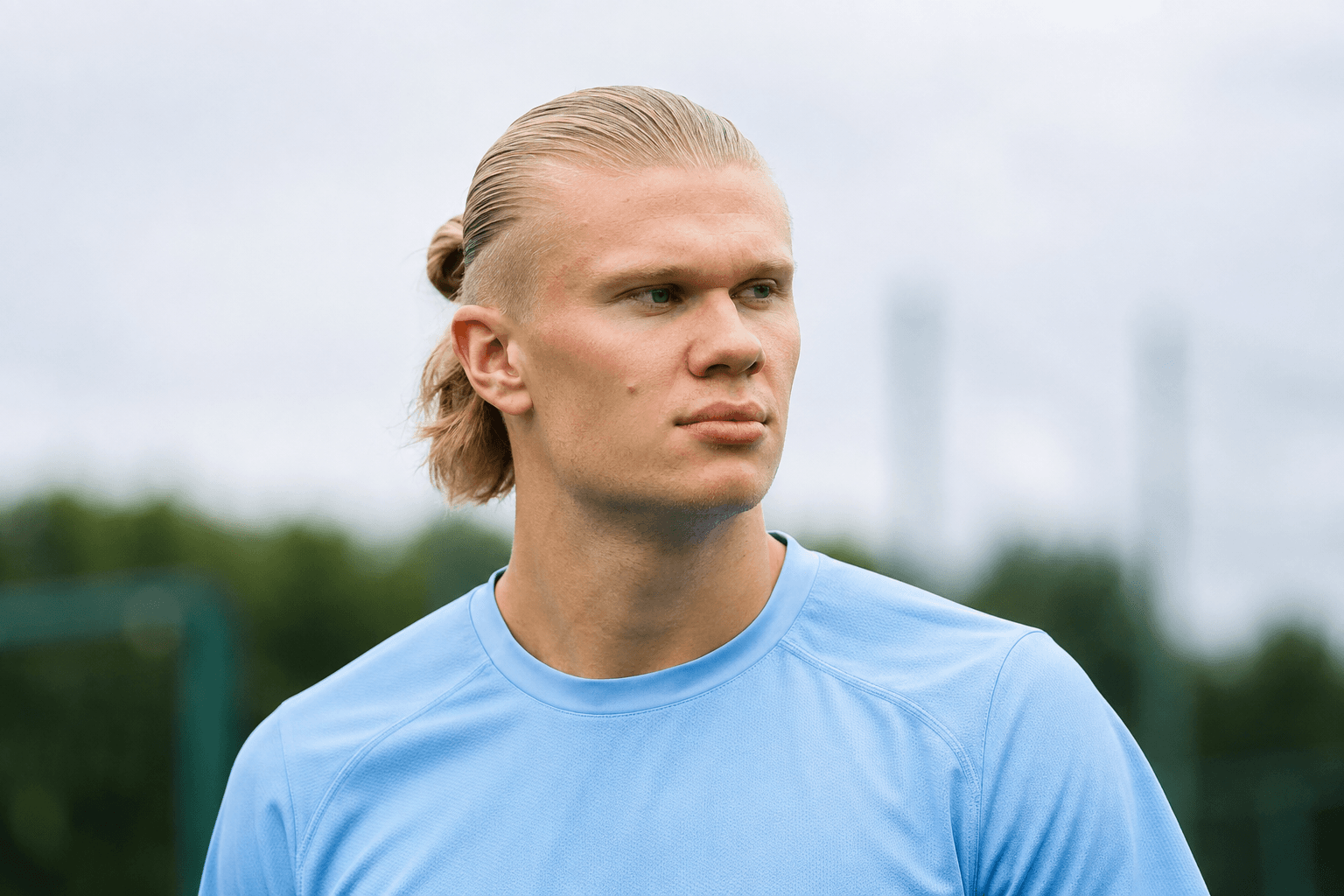 Editorial artwork of Erling Haaland in a sky-blue shirt
